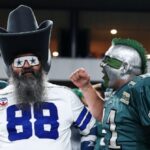 watch:-cowboys-and-eagles-fans-throw-punches-in-wild-stadium-brawl