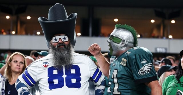 watch:-cowboys-and-eagles-fans-throw-punches-in-wild-stadium-brawl