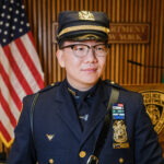 nypd-cop-gets-touching-unexpected-surprise-from-two-special-fans-at-promotion