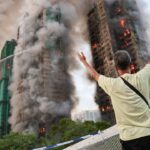 fire-tears-through-hong-kong-housing-complex,-killing-at-least-13-with-others-reported-trapped