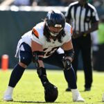 busy-broncos-reach-deals-with-wattenberg,-roach