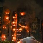 fire-consumes-hong-kong-residential-high-rises,-death-toll-at-13-with-dozens-still-trapped