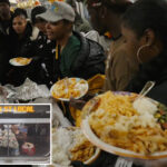 nyc-subway-riders-treat-strangers-to-bountiful-thanksgiving-spread-on-l-train