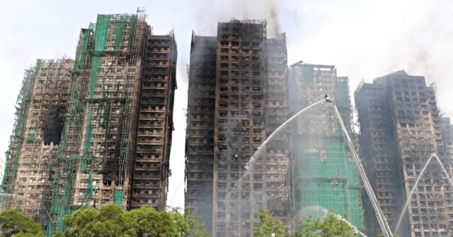 watch:-deadly-fire-at-hong-kong-residential-complex-kills-at-least-55,-three-arrests-made