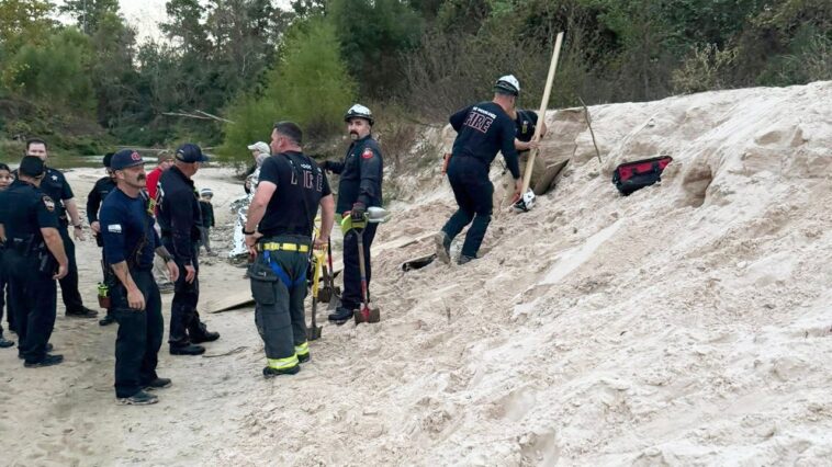texas-girl-rescued-after-sand-hole-she-was-digging-collapses,-burying-her