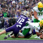 no.-6-oregon-saves-its-seat-in-the-college-football-playoff-with-win-at-washington