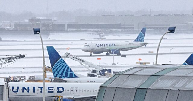 video:-winter-storm-blasting-midwest-cancels-1,400-flights