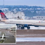 delta-air-lines-plane-slides-off-runway-upon-icy-landing-in-des-moines-international-airport