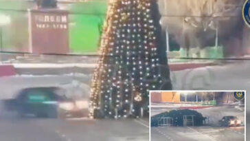 joyride-ends-in-disaster-as-driver-smashes-into-towering-christmas-tree-in-kazakhstan-–-and-is-ordered-to-fix-it