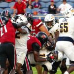 wild-brouhaha-breaks-out-during-bowl-game’s-final-moments-after-late-hit