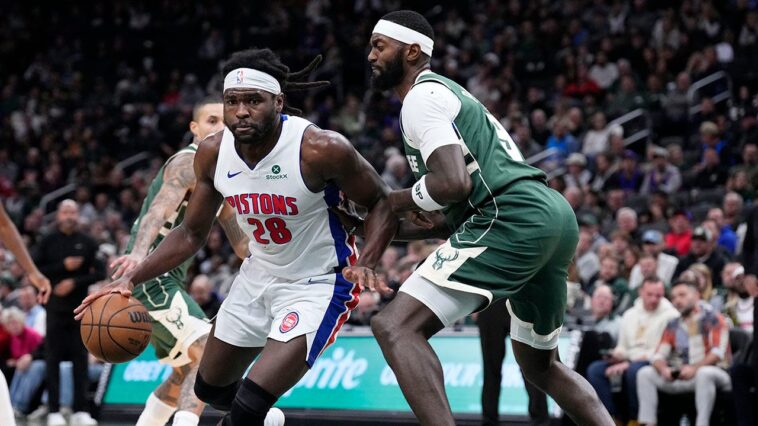 pistons-player-holds-up-fist-to-opponent-during-heated-skirmish