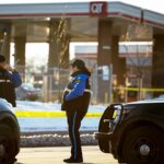 omaha-bystander-flees-gas-station-bathroom-moments-before-armed-man-fires-on-officers