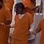 watch-—-‘unity-and-hope’:-michigan-inmates-join-hands-to-pray-the-lord’s-prayer-on-christmas-eve