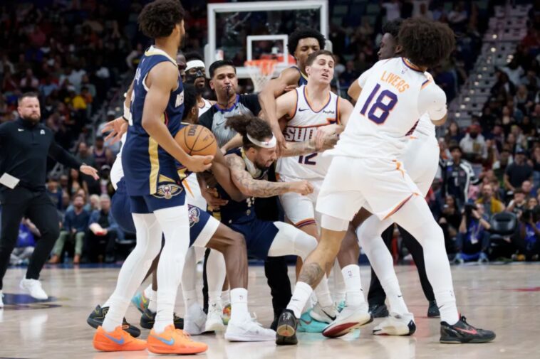 two-players-ejected-after-punches-thrown-during-pelicans-suns-game-in-wild-scene