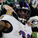 ravens-ride-derrick-henry’s-four-touchdowns-to-keep-playoff-hopes-alive
