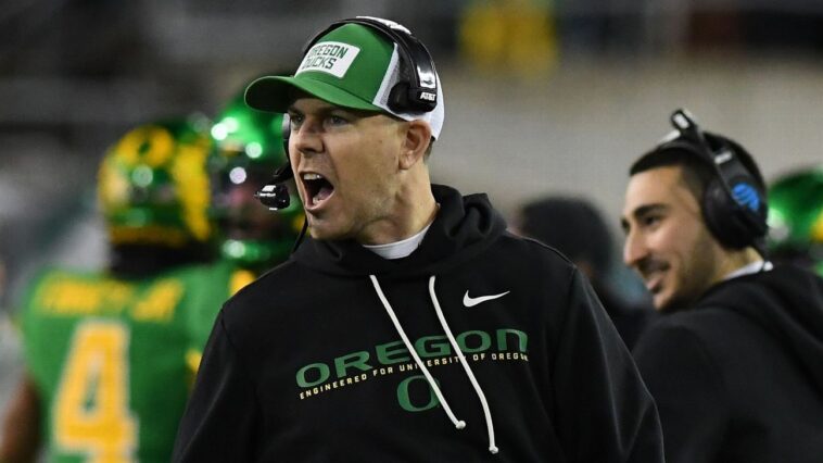 ‘just-lock-in-and-focus’:-how-to-do-two-jobs-in-the-college-football-playoff