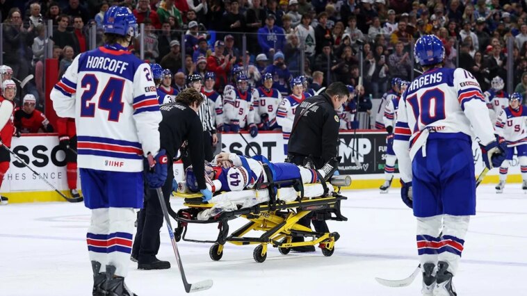 team-usa-hockey-defenseman-leaves-world-juniors-game-on-stretcher-after-being-struck-by-puck