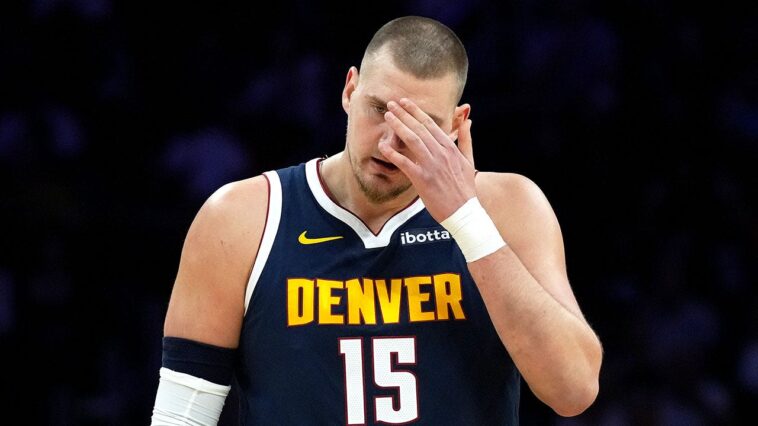 nuggets-star-nikola-jokic-suffers-knee-injury,-misses-entire-second-half-in-loss-to-miami-heat