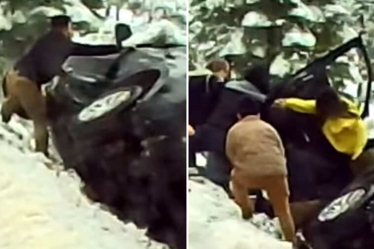 hair-raising-video-captures-air-force-sergeant-saving-couple-after-suv-spins-out,-dangles-off-highway