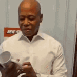 adams-reads-his-‘greatest-hits’-quotes-from-coffee-mug-in-farewell-tribute-as-nyc-mayor