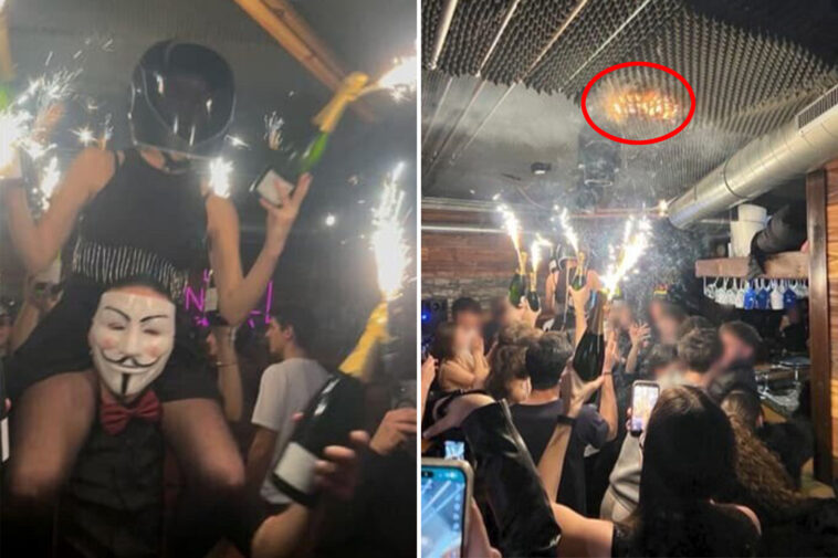 haunting-photo-shows-revelers-waving-flaming-champagne-bottles-as-swiss-nightclub-roof-catches-fire