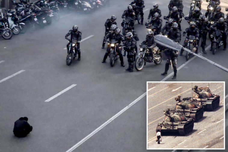 powerful-image-of-lone-iranian-protester-in-front-of-security-forces-draws-parallels-to-tiananmen-square-‘tank-man’