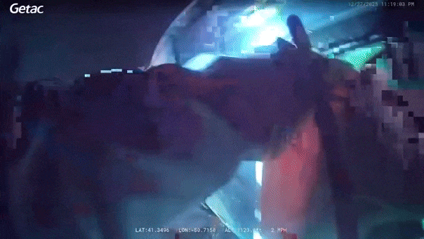 watch:-ohio-police-smash-sunroof,-drag-injured-driver-from-burning-car-after-rollover-crash