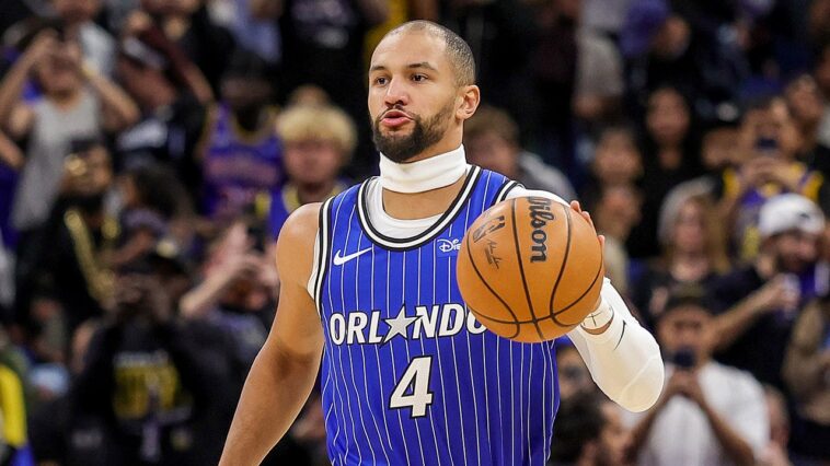 nba-shuts-down-magic-guard’s-signature-headband-ritual-at-start-of-games