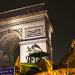 ‘we-will-not-die-in-silence’:-farmers-overwhelm-police-in-paris-to-protest-outside-national-assembly