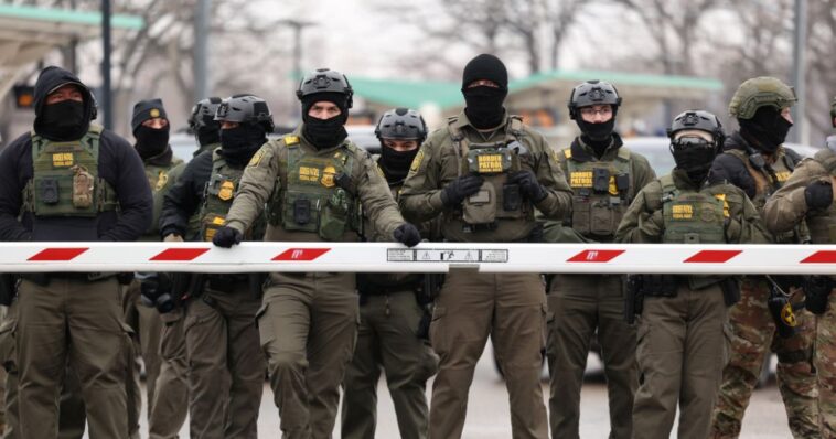 must-see:-ice-agent-rescues-rose-from-ground,-gifts-it-to-grateful-female-agent-in-middle-of-chaotic-demonstration