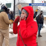 masked-agitator-tells-laura-ingraham-she’s-‘getting-paid-right-now’-at-anti-ice-protest