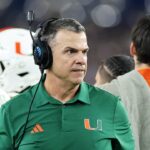 miami-coach-mario-cristobal-wrestles-out-of-hug-after-carson-beck’s-touchdown-in-viral-moment