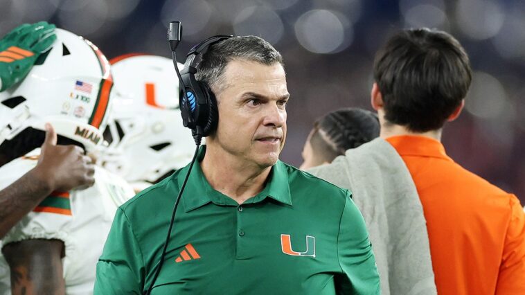 miami-coach-mario-cristobal-wrestles-out-of-hug-after-carson-beck’s-touchdown-in-viral-moment