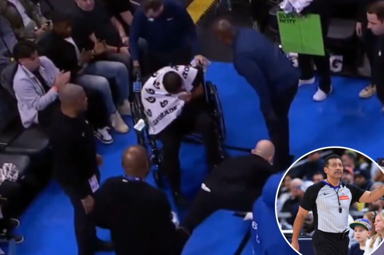 nba-referee-taken-off-on-wheelchair-after-suffering-injury