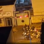armed-iran-protesters-battle-police-in-tehran-streets-as-trump-warns-of-forceful-us-response