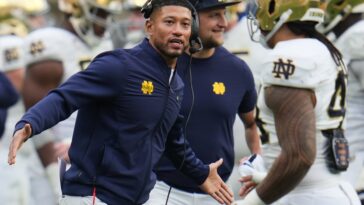 notre-dame’s-marcus-freeman-accused-of-battery-by-wrestling-coach-after-son’s-match