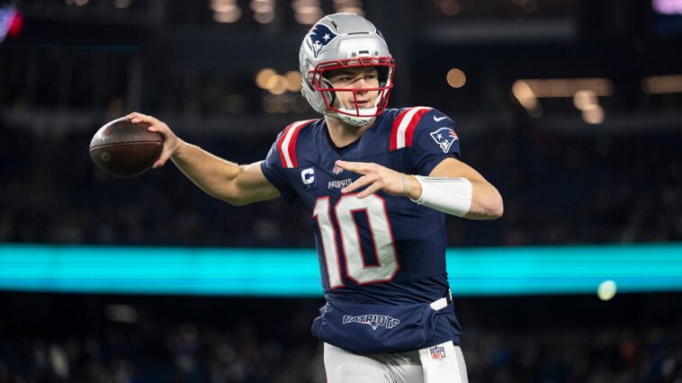 patriots-crush-chargers-in-wild-card-defensive-slugfest,-secure-first-playoff-win-since-2018