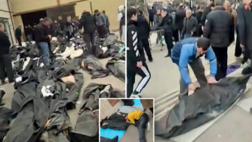 gut-wrenching-footage-shows-grieving-families-in-iran-wailing-and-desperately-searching-through-rows-of-dead-bodies-for-loved-ones