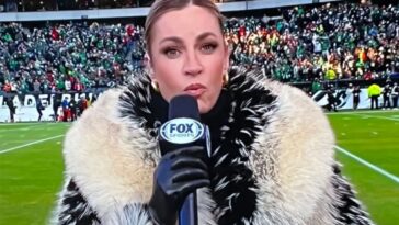 erin-andrews’-massive-faux-fur-coat-riles-up-fans-during-49ers-eagles-playoff-clash