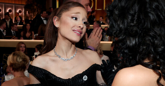 pop-star-ariana-grande-flaunts-‘ice-out’-pin-at-golden-globes