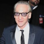 bill-maher-laughs-at-celebrities-honoring-renee-good-with-pins-at-golden-globes