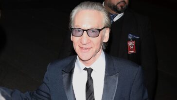 bill-maher-laughs-at-celebrities-honoring-renee-good-with-pins-at-golden-globes