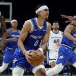 magic’s-anthony-black-makes-incredible-dunk-over-four-defenders-in-historic-nba-game