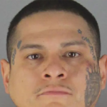 watch:-gang-member-arrested-after-allegedly-caught-on-video-stealing-weapons-from-fbi-vehicle