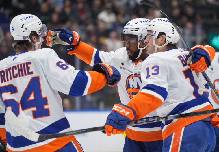 islanders-grind-out-win-over-lowly-canucks-in-messy-performance