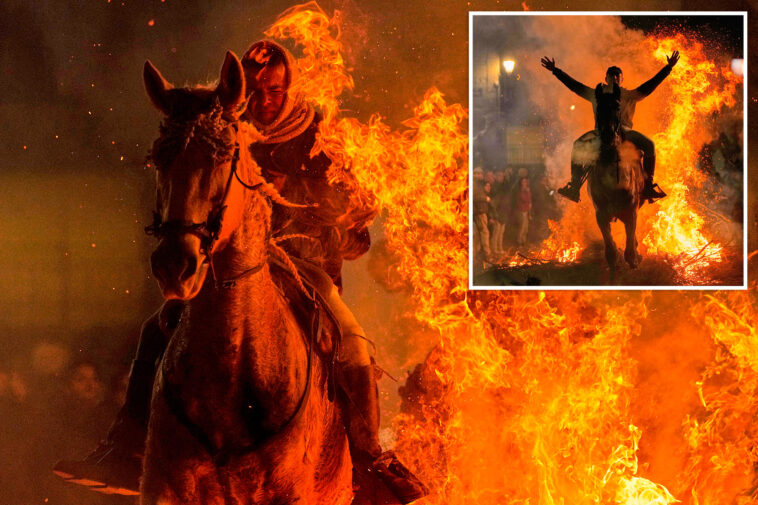 horses-leap-through-flames,-beer-and-wine-flow-at-ancient-annual-‘las-luminarias’-bash-in-spain