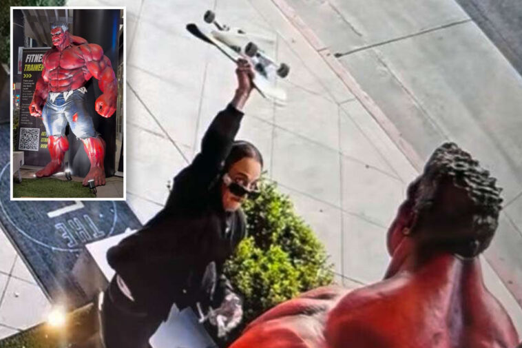 unhinged-skateboarder-attacks-life-sized-marvel-comics-red-hulk-statue-outside-la-gym