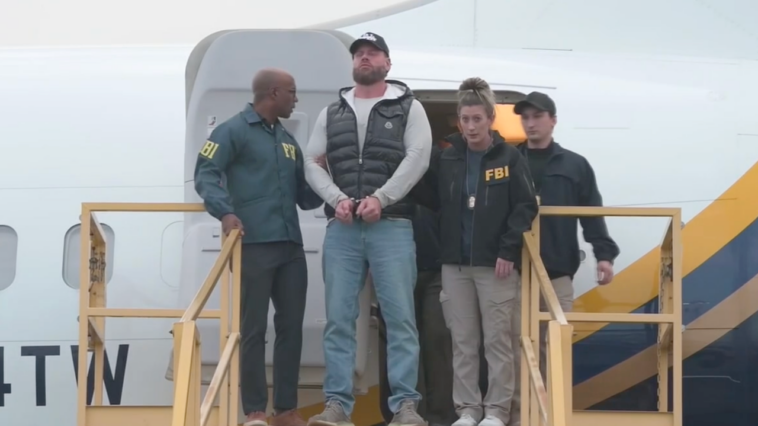 ex-olympian-ryan-wedding-arrives-in-us,-escorted-off-plane-in-cuffs-by-fbi-after-mexico-capture