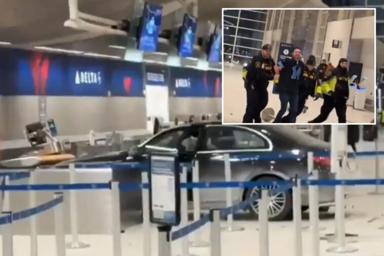 driver-crashes-into-detroit-metro-airport-terminal—-hauled-away-by-police-in-shocking-scene