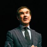 watch:-british-comedian-jimmy-carr-takes-down-woke-audience-member,-reminds-crowd-of-woke’s-satanic-origin